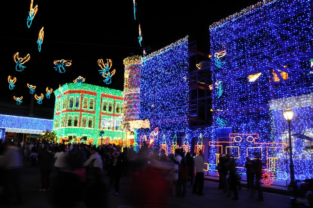 Glowing Christmas Lights And Trees On The Street