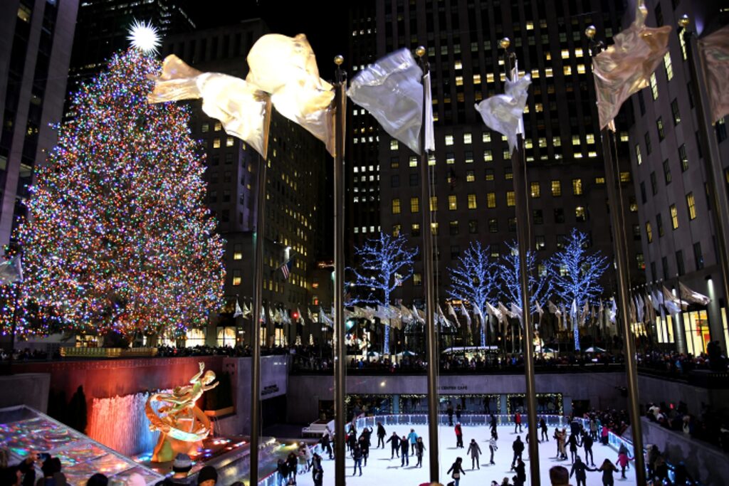 Glowing Christmas Lights And Trees On The Street