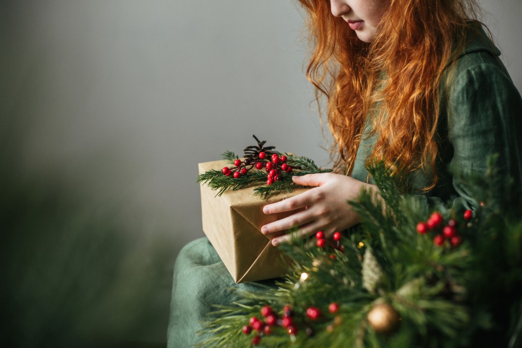 Girl Holding Christmas Gift